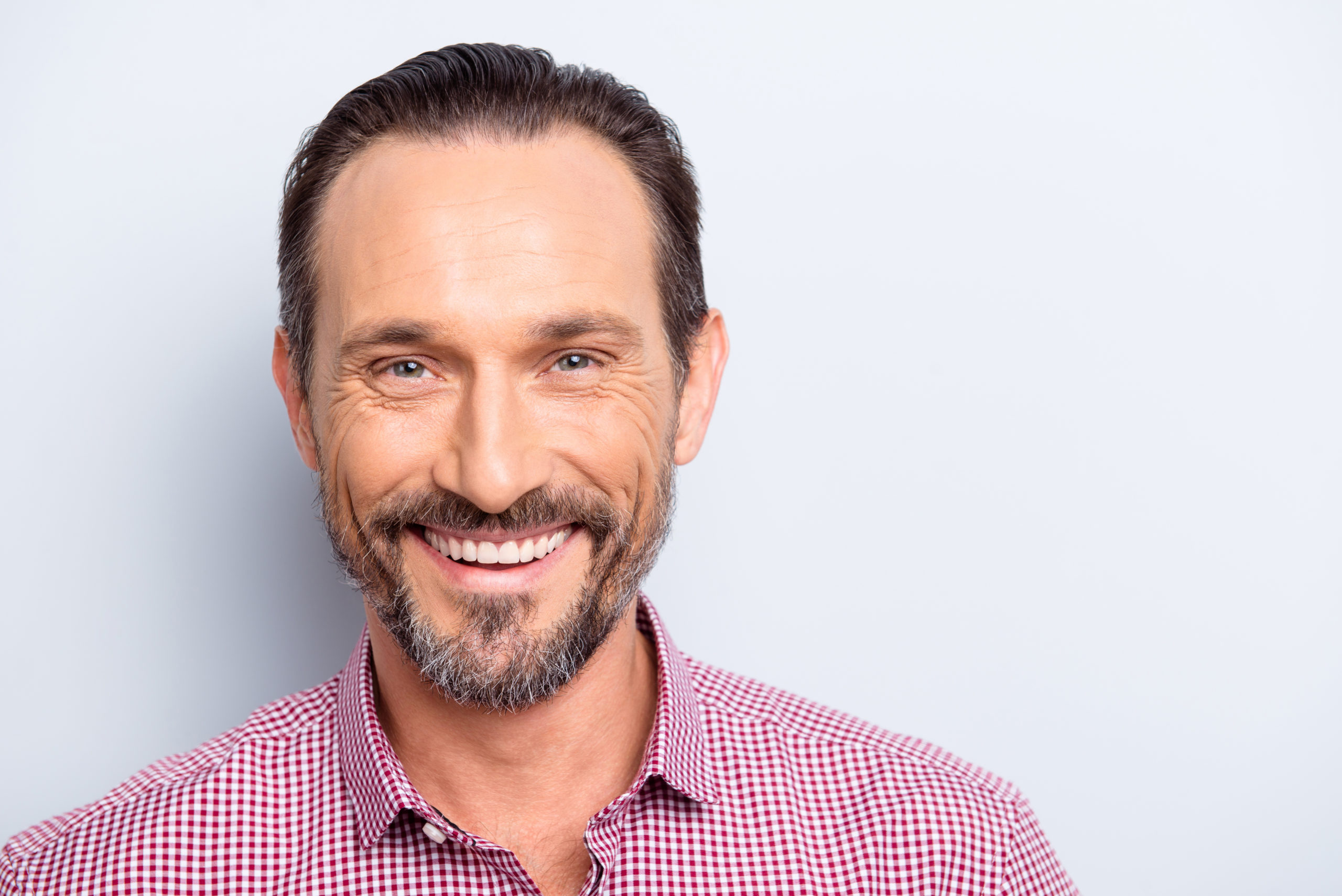 Close up portrait of attractive handsome good wearing man make b